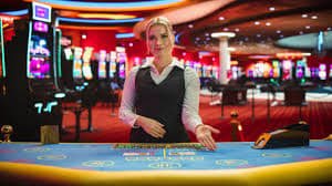 rollingspin slot Sic Bo Dadu game table with dice cage and betting layout